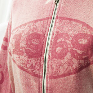 Custom Soft Hand Tonal Print pink zip up sweater from Righteous 