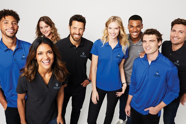 Employees wearing high quality branded work uniforms