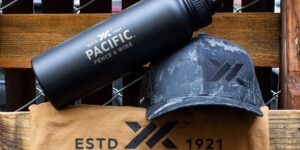 Custom promotional products from RCHQ, including a black water bottle and a black hat branded for Pacific Fence and Wire.