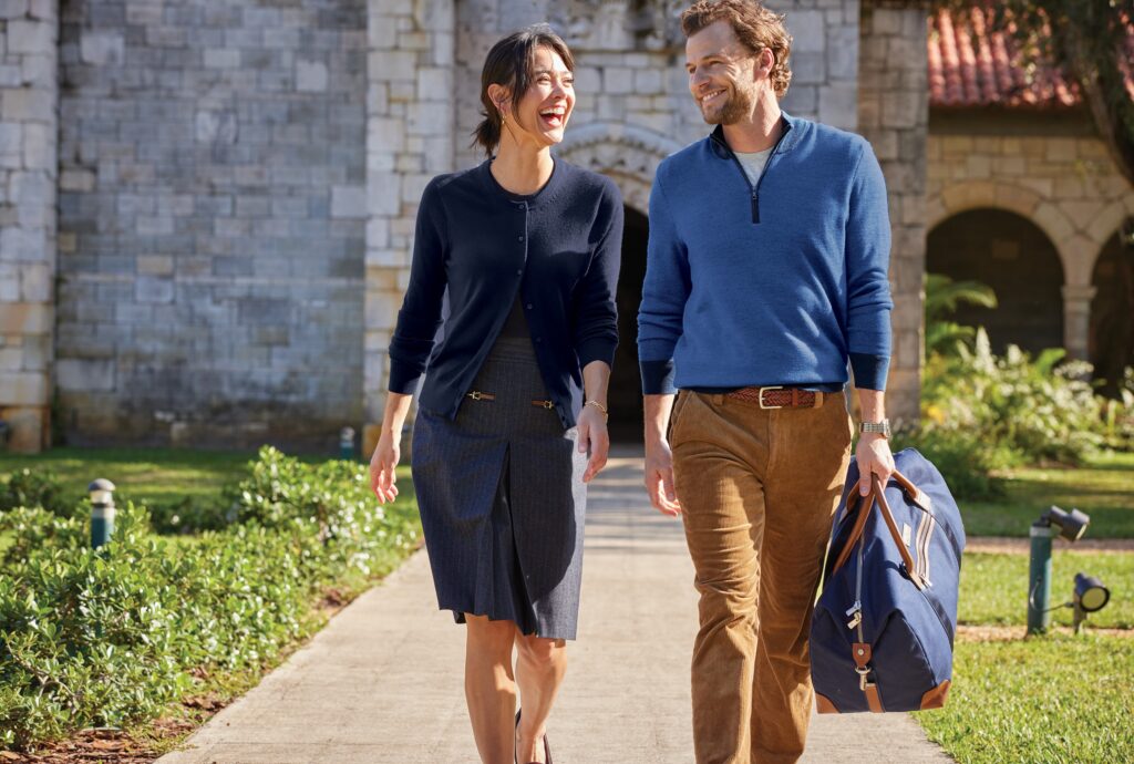 Executives in Righteous apparel walking outdoors in coordinated, business-casual outfits.