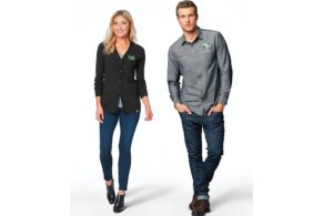 Woman and man modeling Righteous Clothing Agency apparel, walking forward in jeans, button-down tops, and ankle boots.