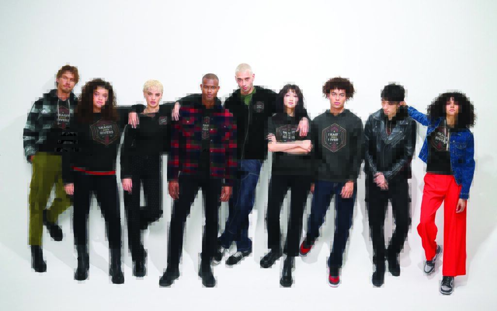 Diverse group of models wearing merchandise from Righteous Clothing Agency in a studio fashion lineup.