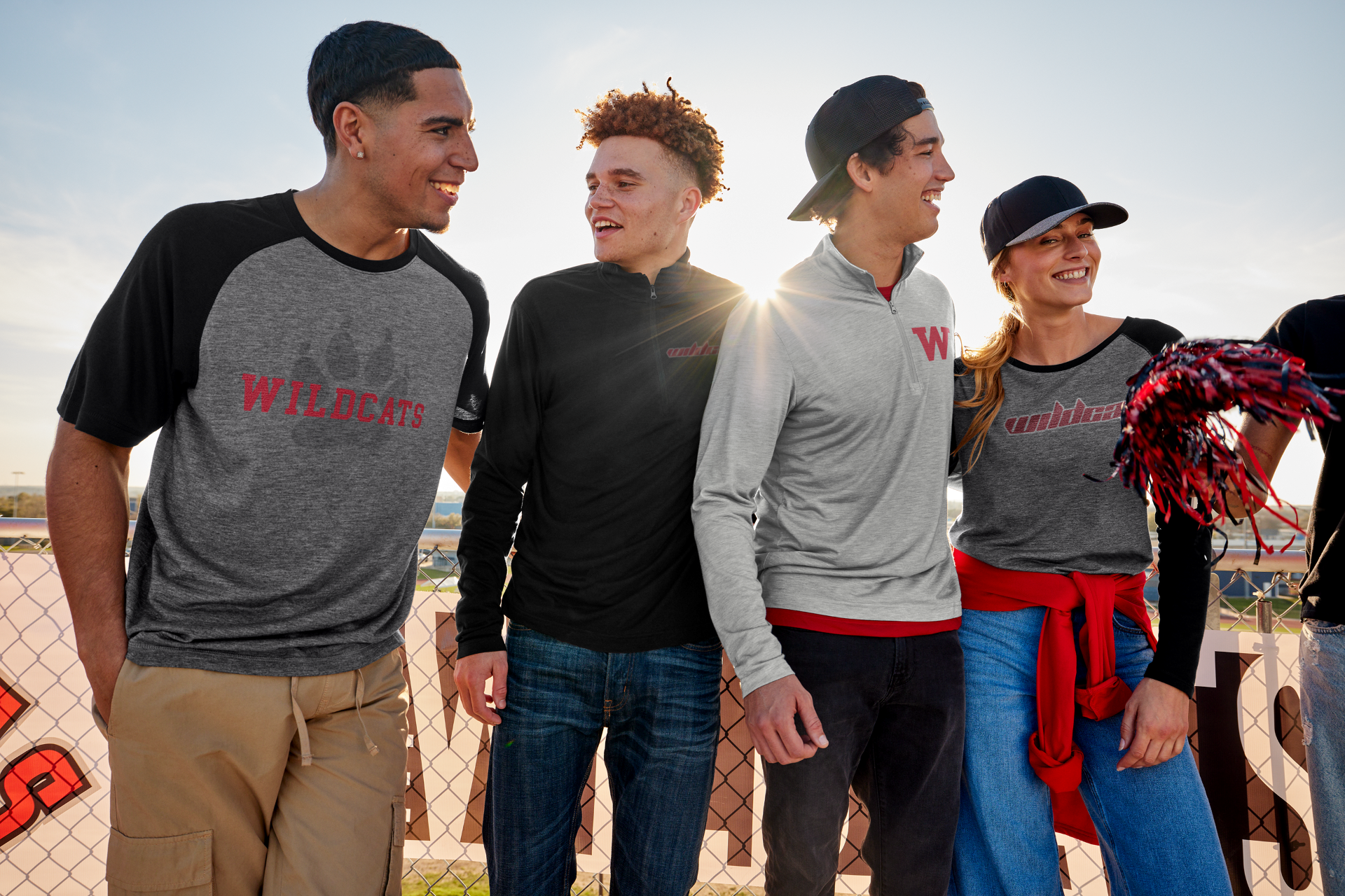Fans in branded Wildcats apparel supplied by Righteous Clothing Agency.