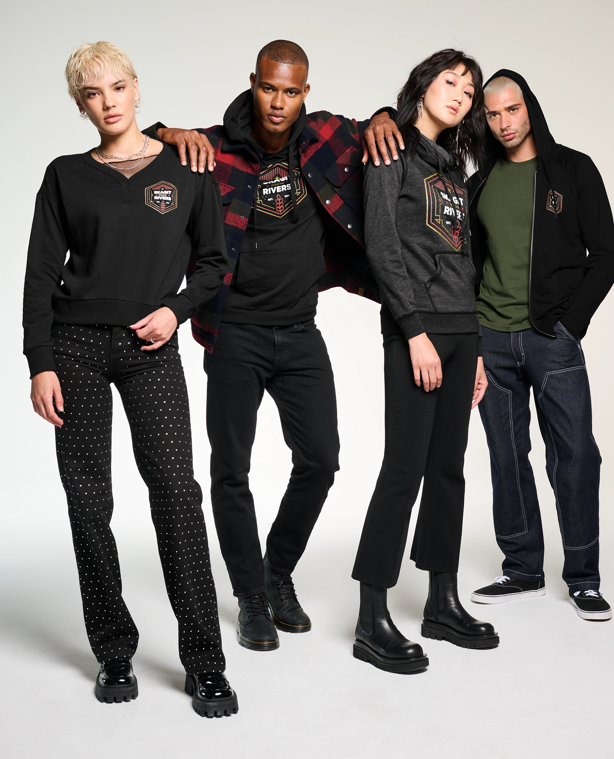 Four people in coordinated black graphic hoodies from Righteous posing together on a white background.